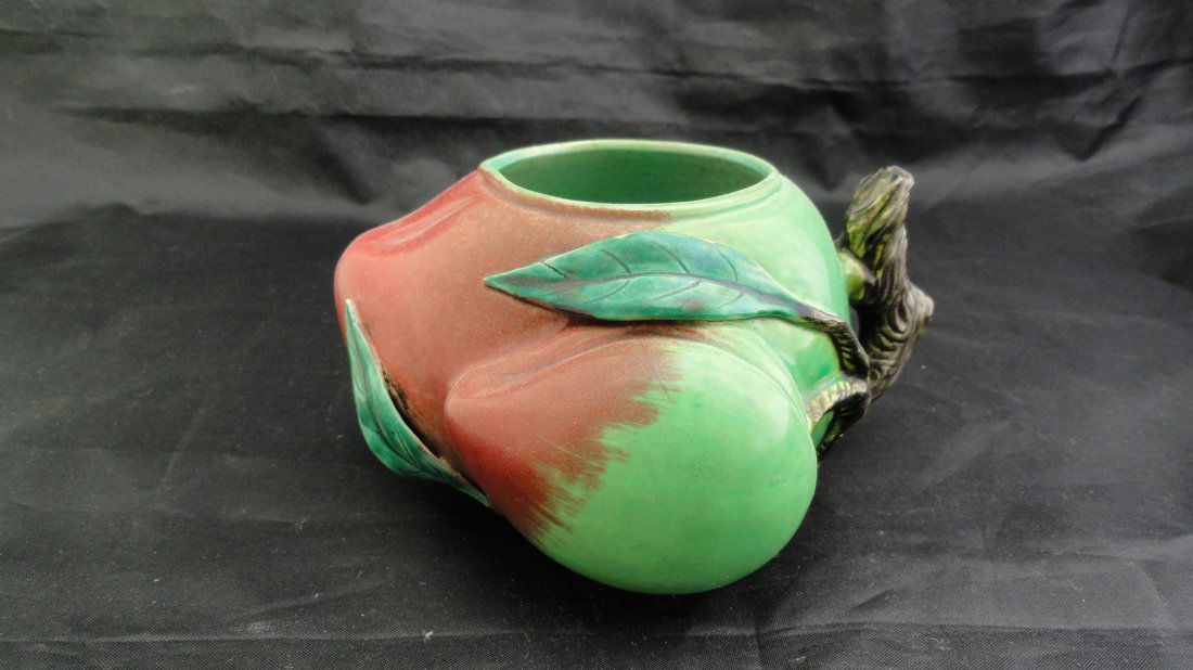 016: Chinese Famille Rose Scholar Coupe early 1900's: A Chinese scholar coupe made in the form of a peach, decorated in fine famille rose enamels, signed Qianlong but from the early 1900's. This coupe measures, in excellent condition.