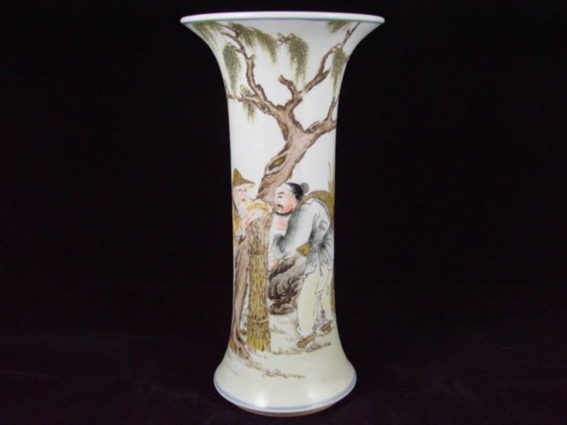 009: Fine Chinese vase from the early 1900's: A Chinese vase decorated in famille rose enamels to show a fishing man talking to a hunter while leaning on a large willow tree, signed at the underside from the early 1900's. This vase measures 10 in