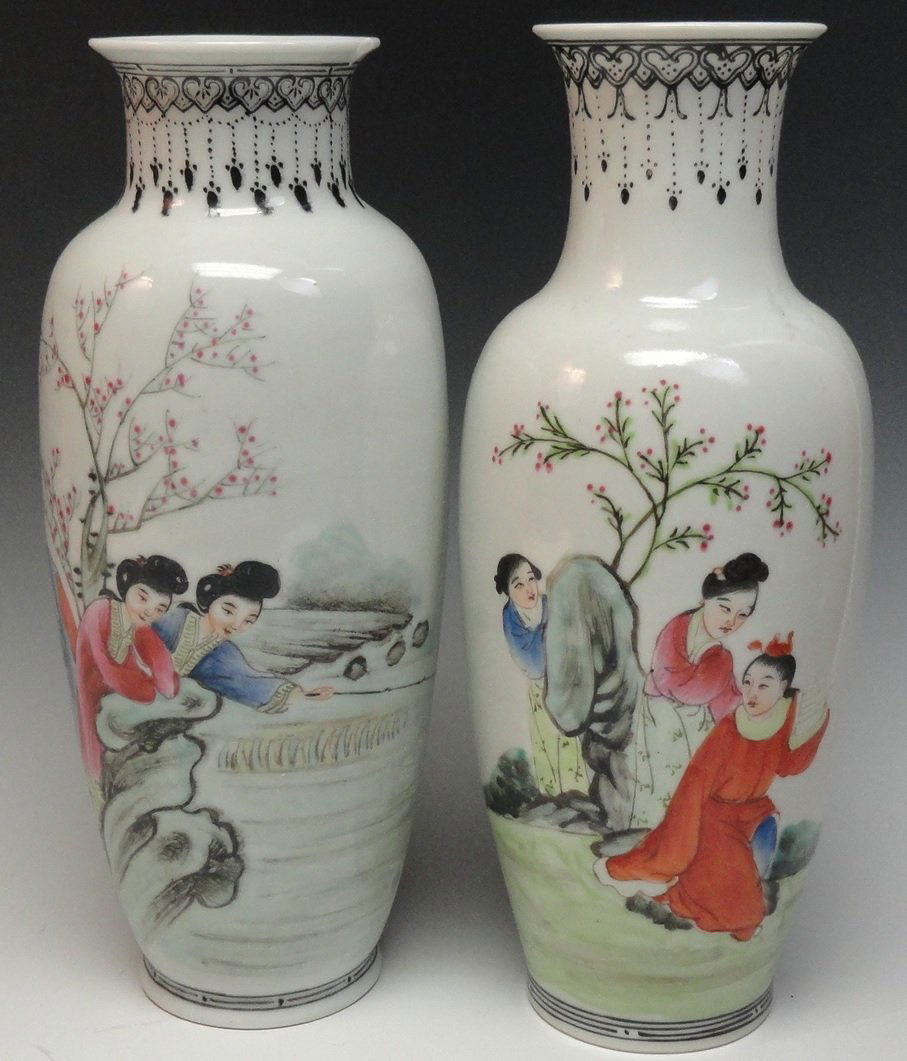 Pair Chinese Vases from the early 1900's: Pair of Chinese vases decorated with the scenes from the West Chamber Romance, measures 9 inches tall, from the early 1900's. One vase has a small chip. The other vase is in excellent condition. This