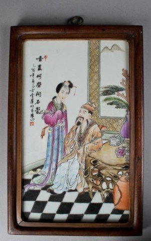 A Porcelain Plaque from an early 1900's Importan Artist: A Chinese Famille Rose Plaque decorated with a noble man talking to his concubine. This plaque measures 20 inches tall and 9 inches wide, in excellent condition. This lot costs $20 to ship within the 