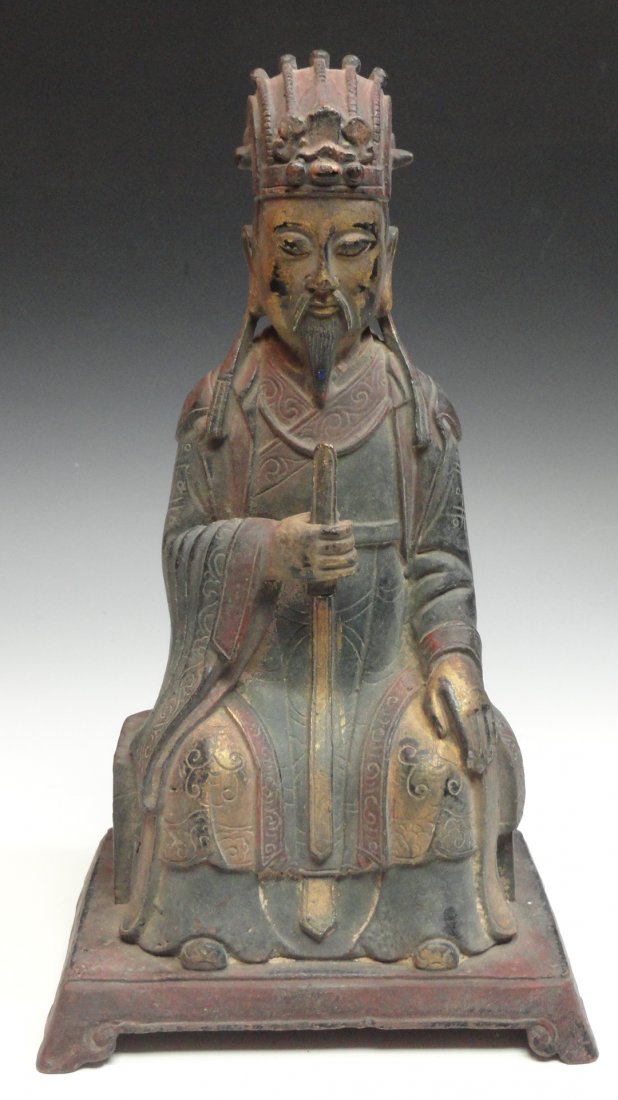 An old Chinese Bronze Statue of a Deity: This lot is for Chinese bronze statue of a deity holding a scepter, from the early 1900's. It measures 10 inches tall and 5.5 inches wide, in excellent condition. This lot is heavy and costs $30 to sh