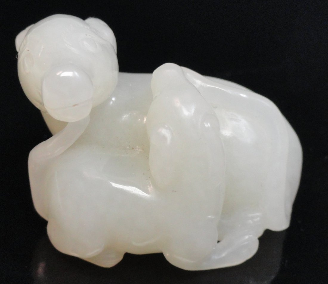 Antique White Nephrite Jadeite Carving, Rams: A Chinese white Nephrite Jadeite carving featuring two rams, from the early 1900's. This carving measure 2 inches wide and 1.5 inches tall, in excellent condition. This carving costs $20 to ship withi