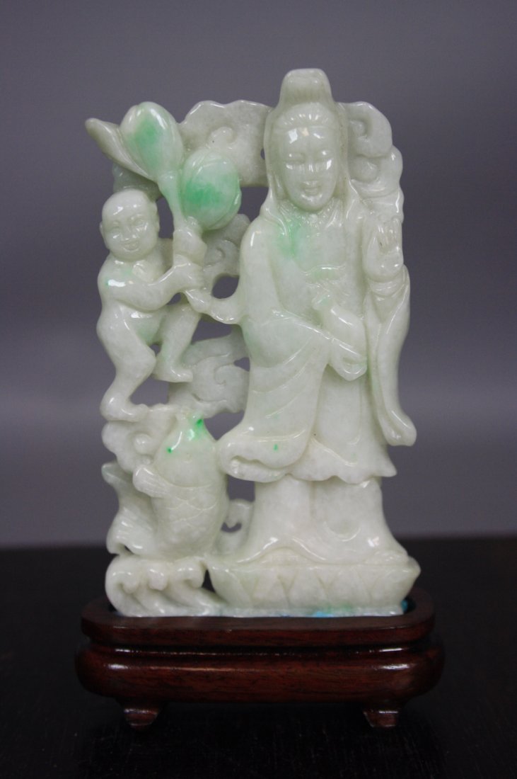 Chinese Jadeite Carved GuanYin With Kid on Wood St: Chinese Jadeite Carved GuanYin With Kid on Wood Stand. Measurement : 11cm x 5.3cm