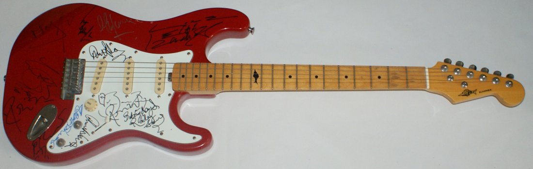 Rolling Stones Multi Signed Electric Guitar Stunni: ELECTRIC GUITAR GUITAR SIGNED BY THE ROLLING STONES MEMBERS AND BACKING BAND This lot is a fully sized, working electric guitar, which has been autographed by The Rolling Stones and their backing band