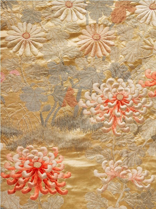Japanese Wall Hanging: c. 1920, with embroided floral scene of pale blues, greens and pinks on pale golden silk background, and the backing side a printed cotton depicting floral pattern of blues and purples (A/F) height 26