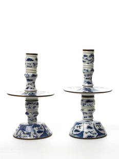 Pair of Chinese Blue and White Two Section Candle: late 19th or early 20th century, decorated with Qilin and Clouds, underside of drip trays painted with bats, four character marks Jin Tang Fu Ji (Jin Tong Fu Company) (2) The Barbara Sheridan Donnay a