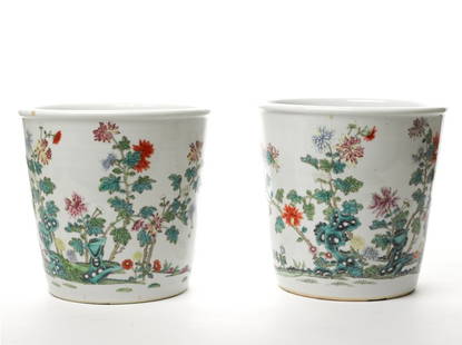 Pair of Chinese Famille Rose Jardinieres: very finely painted with foliage amongst rocks, probably Republic Period (1912-1949)with Daoguang seal marks (2) The Barbara Sheridan Donnay and the Late Gilbert J. Donnay Collection height 23 cm