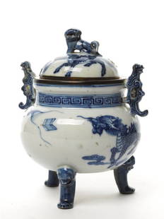 Chinese Blue and White Censer and Incense Holder: censer late 19th or early 20th century, with mask-head and paw feet, metal mounted rims, foo dog finial and archaistic dragon handles, together with incense holder of baluster form with associated por