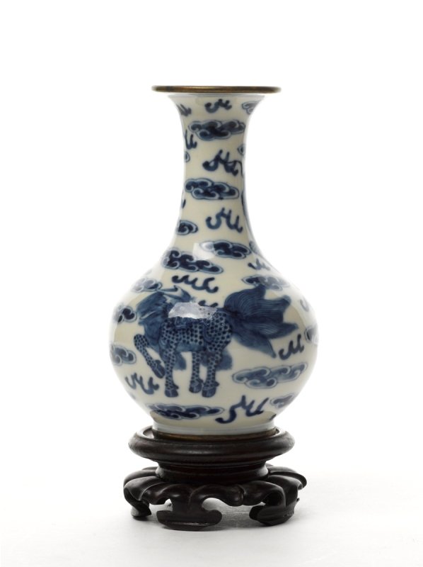 Chinese Blue and White Vase and Two Bowls: vase late 19th or early 20th century, decorated with Qulin and clouds, four character mark to base Tao Yu Zhen Cang (Pottery and Jade Precious Treasure), metal mounted rim and foot together with two b
