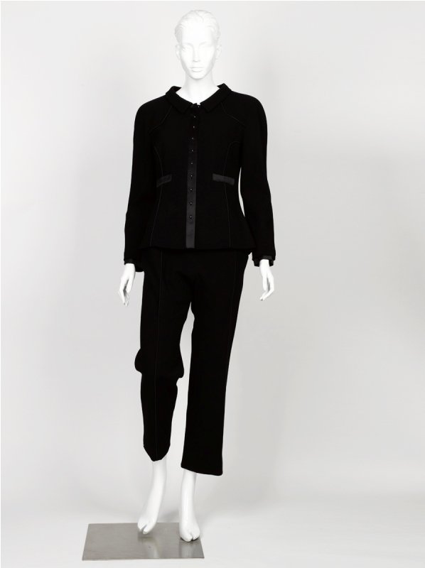 Chanel Black Wool Suit: Chanel Black Wool Suit with satin trim and black piping detail, fully lined, the pants of straight leg design with side zipper closure, labelled Chanel made in France Marked Size 42