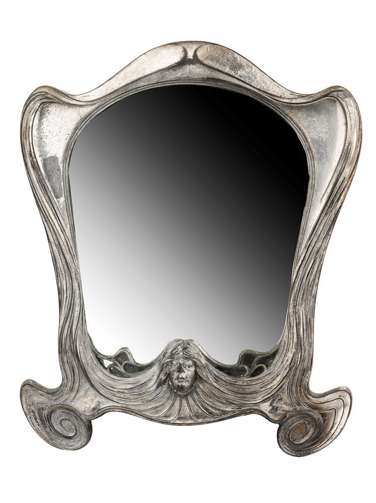 Art Nouveau Mirror: Art Nouveau Mirror mixed metal, cast in the form of a stylised female head and whiplash hair, attributed to WMF, German, c. 1900