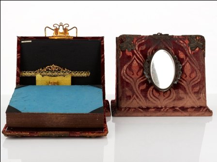 Pair of English Victorian Table Top Photo Albums: Pair of English Victorian Table Top Photo Albums cut velvet cover with applied gilt mount decoration, oval mirrored front, fitted interior for photographs, with desk stand, patented 'July 23 1895' (2)
