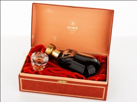 Boxed Bottle of Scotch and Cognac: Boxed Bottle of Scotch and Cognac comprising a King of Scots limited edition bottle of Douglas Laing & Co Scotch c. 1979, together with a Hine Napoleon Cognac, decorated with the company stag emblem o