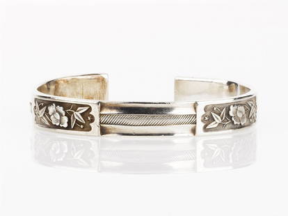 Chinese Silver Bangle: Chinese Silver Bangle decorated with floral panels, signed weight 58 grams