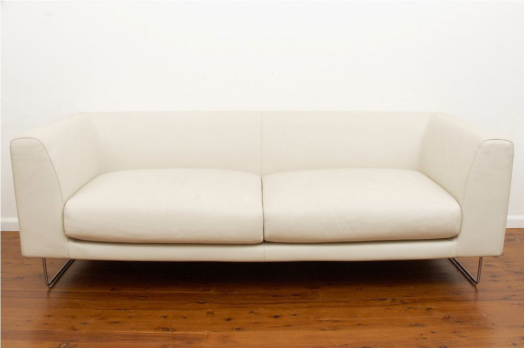 Jasr Morrison, Elan Sofa: Jasr Morrison, Elan Sofa steel and wood frame, multi-density polyurethane foam upholstery with removable cream leather cover, stained stainless steel feet, manufactured by Cappellini, c. 1999