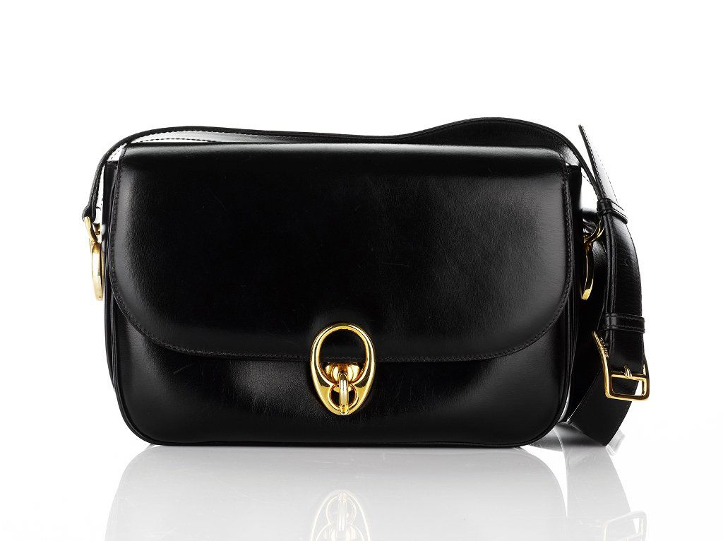 Celine, Black Shoulder Evening Bag: smooth black leather with gold-tone hardware, flap over with clasp closure at front, three internal compartments, original dust bag, together with a Celine navy leather and gold-tone buckle belt, orig