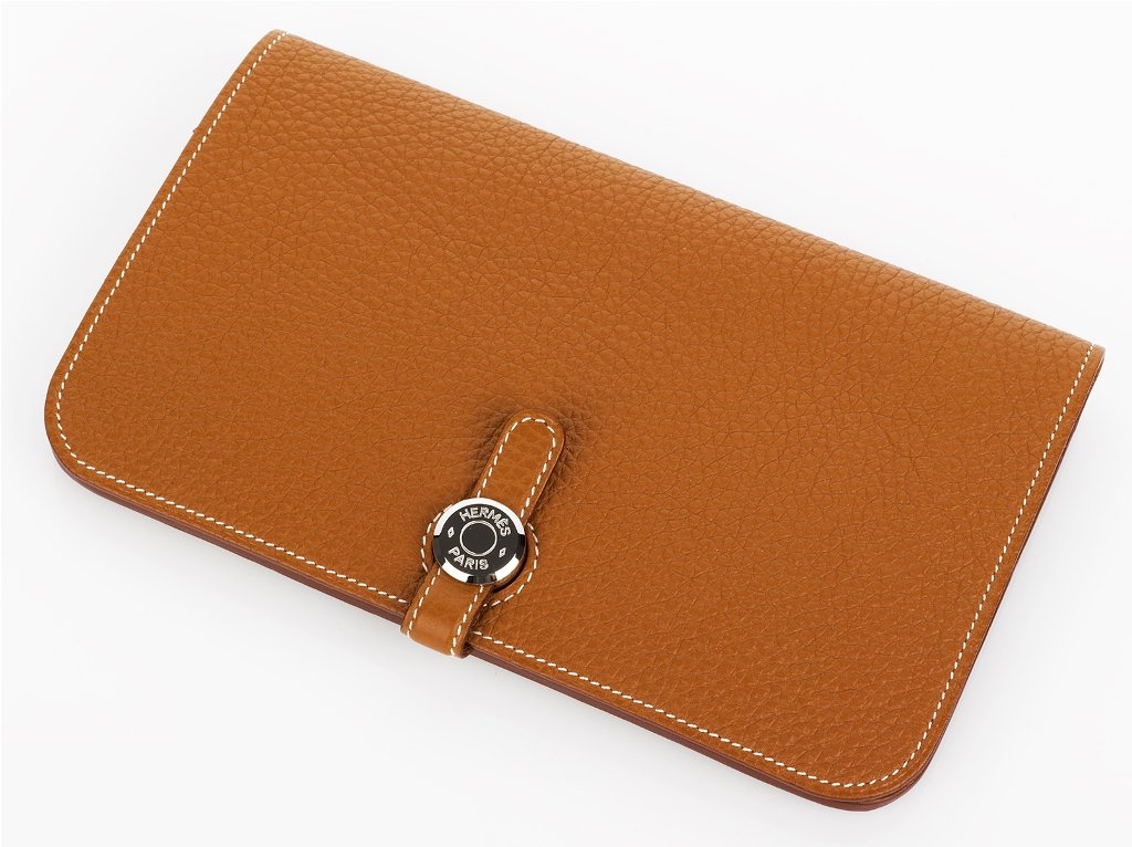 Hermes, Dogon Combined Wallet: togo leather, light coffee colour, palladium 'Clou de Selle' tab with leather strap closure, removable change purse with zipper stamped 'Hermes Paris', made in France