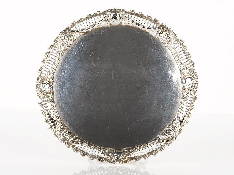 Robert Jones and John Scofield, London, 1776, Pair of G: Robert Jones and John Scofield, London, 1776, Pair of George III Sterling Silver Cast Border Salvers circular form, curved border with pierced swag, hung and patera decoration each raised on three fee