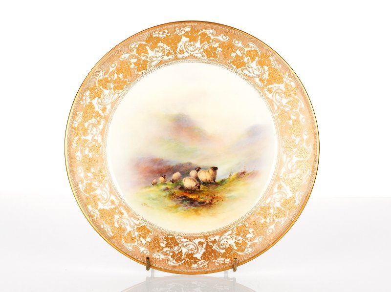 Ernest Barker for Royal Worcester: Ernest Barker for Royal Worcester Bone China Plate, c. 1923 painted with highland black faced sheep, gilt border of grapes and vines, signed 'E. Barker' printed factory marks, impressed model mark 'Y2