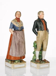 Carl Martin - Hansen (1877-1941): Carl Martin - Hansen (1877-1941) Two Porcelain Figures in National Danish Costume each stamped with Royal Copenhagen wave mark, model 12227 'Frederiksbourg model 12221 FAERO' height 32cm (A/F) Note: C