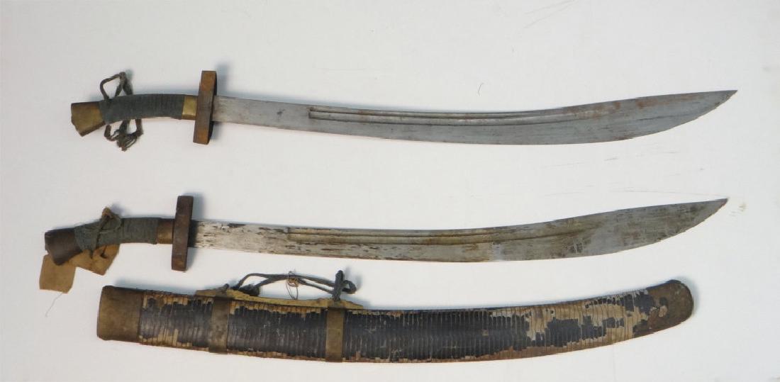 19THC. SHUANGNIUWEIDAO OXTAIL DAO SWORDS (1 of 7)