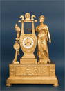 FRENCH GILT BRONZE EMPIRE FIGURAL CLOCK, C.1820