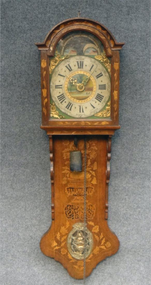 INLAID ALPINE WAG ON THE WALL CLOCK W/ HAND PTD: DIAL (50 1/2" TALL X 12 3/4" WIDE)