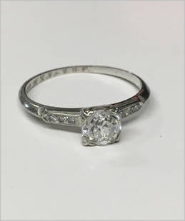 APPROXIMATELY .60 CARAT DIAMOND ENGAGEMENT RING: APPROXIMATELY .60 CARAT DIAMOND ENGAGEMENT RING PLATINUM SETTING W/ 6 SIDE DIAMONDS APPROX. .9 DWT