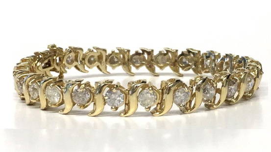 DIAMOND TENNIS BRACELET IN 14KT YELLOW GOLD APPROX. 8: DIAMOND TENNIS BRACELET IN 14KT YELLOW GOLD APPROX. 8 CTW 8" LONG APPROX. 14.4 DWT