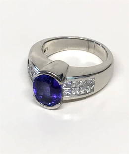 TANZANITE & DIAMOND RING SET IN PLATINUM (APPROX. 3.5: TANZANITE & DIAMOND RING SET IN PLATINUM (APPROX. 3.5 CT TANZ & 1 CTW DIAM) 13.2 DWT RING SIZE 7