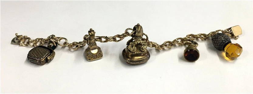 14KT YELLOW GOLD 7" CHARM BRACELET W/ 5 VINTAGE WATCH: 14KT YELLOW GOLD 7" CHARM BRACELET W/ 5 VINTAGE WATCH FOBS (BRACELET APPROX. 11 DWT )