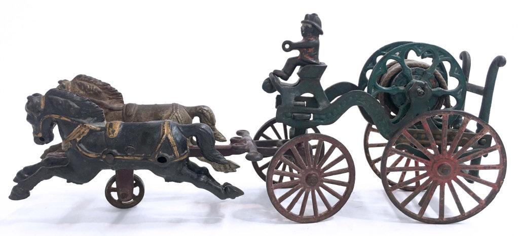 RARE CAST IRON HORSE DRAWN FIREMAN'S HOSE REEL 13 3/4": RARE CAST IRON HORSE DRAWN FIREMAN'S HOSE REEL 13 3/4" LONG 13 3/4" LONG