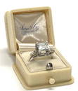 3.12 CARAT ASSCHER CUT DIAMOND SET W/ 2 BAGETTES IN