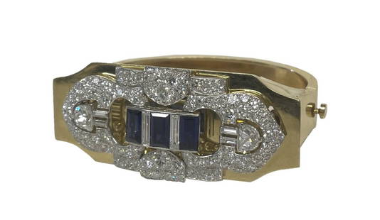 DIAMOND & SAPPHIRE BROOCH ON 14KT GOLD BANGLE BROOCH IN 18KT WHITE GOLD, APPROX. 2.5 CTTW NATURAL: DIAMOND & SAPPHIRE BROOCH ON 14KT GOLD BANGLE BROOCH IN 18KT WHITE GOLD, APPROX. 2.5 CTTW NATURAL SAPPHIRES, HALF MOON DIAMONDS APPROX. .75 CT EACH (BANGLE 14KT APPROX. 22.3 DWT)