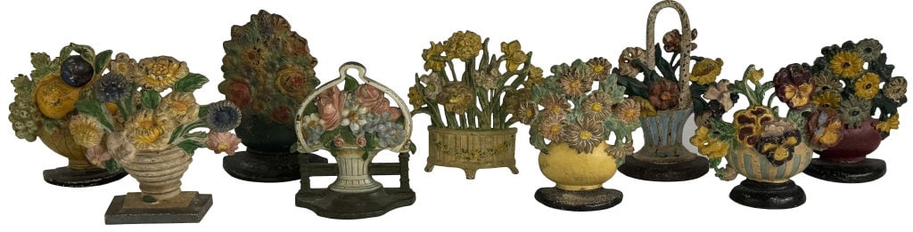 9 CAST IRON DOORSTOPS IN ORIG. PAINT, TALLEST 8 1/2": 9 CAST IRON DOORSTOPS IN ORIG. PAINT, TALLEST 8 1/2"