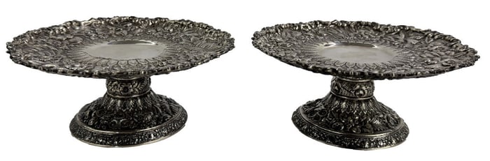 PR OF TIFFANY & CO. STERL. SILVER TAZZAS IN HEAVY FLORAL REPOUSSE 7" DIAM APPROX. 21.34 TROY OZ