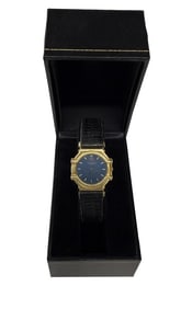 18KT JEAN LASSALE, GENEVE WRIST WATCH W/ BLUE FACE THALASSA, SWISS MOVEMENT  1" DIAM
