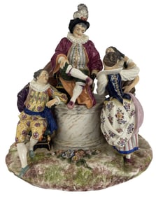 MEISSEN GROUP OF FIGURES AND A DOG AT A WELL HEAD 13 1/2" X 13"