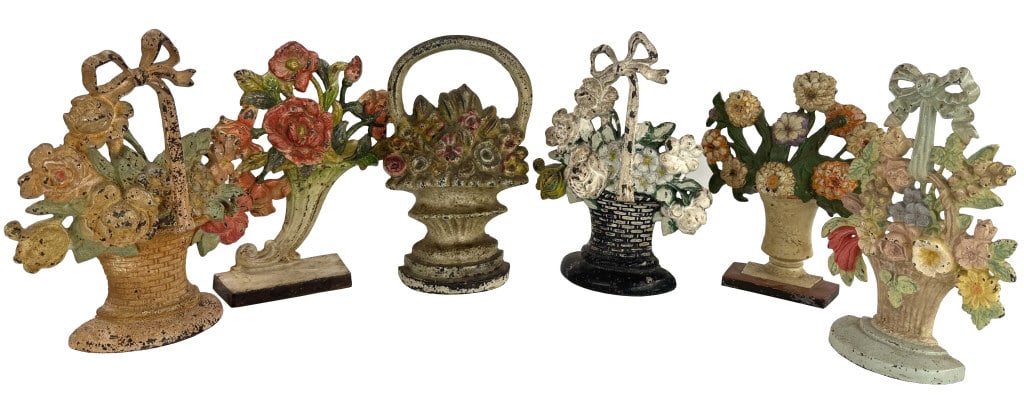 6 CAST IRON DOORSTOPS, ALL BASKETS OF FLOWERS ALL APPROX. 10 1/2" TALL: 6 CAST IRON DOORSTOPS, ALL BASKETS OF FLOWERS ALL APPROX. 10 1/2" TALL