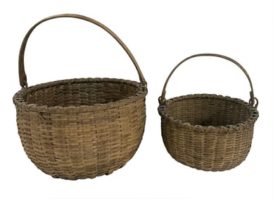 TWO SWING HANDLED TACONIC BASKETS 16" DIAM & 12 1/2" DIAM