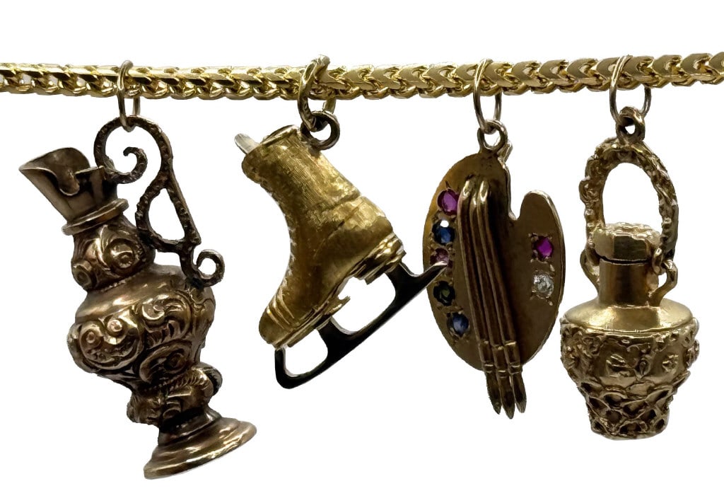4 GOLD CHARMS: EWER, ARTIST PALLETTE, SCENT BOTTLE ALL 14 KT & 18KT ICE SKATE: 4 GOLD CHARMS: EWER, ARTIST PALLETTE, SCENT BOTTLE ALL 14 KT & 18KT ICE SKATE APPROX. 12.2 DWT