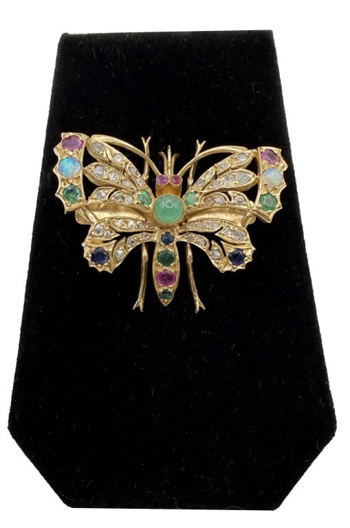 VINTAGE 14KT BUTTERFLY BROOCH WITH MULTICOLORED GEMSTONES INC. DIAMONDS, RUBIES, SAPPHIRES, EMERALDS: VINTAGE 14KT BUTTERFLY BROOCH WITH MULTICOLORED GEMSTONES INC. DIAMONDS, RUBIES, SAPPHIRES, EMERALDS & OPALS MARKED 14K / CHF APPROX. 8.8 DWT 1 1/2" X 2"