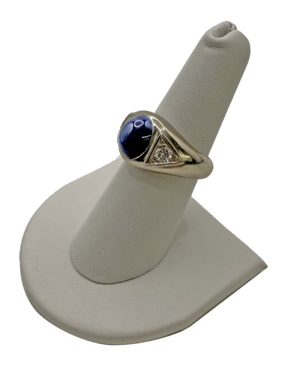 14KT WHITE GOLD STAR SAPPHIRE RING W/ DIAMONDS MARKED 14 KT PRISM LITE RING APPROX. 7 1/2 APPROX.: 14KT WHITE GOLD STAR SAPPHIRE RING W/ DIAMONDS MARKED 14 KT PRISM LITE RING APPROX. 7 1/2 APPROX. 7.4 DWT