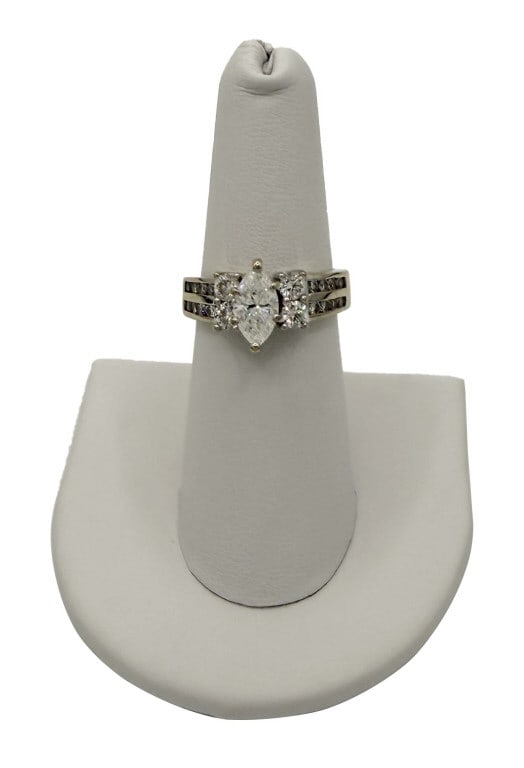 MARQUISE CUT DIAMOND FLANKED BY SM ROUND CUT DIAMONDS TCW 1.60 RING SIZE 7 14KT, 4.5 DWT: MARQUISE CUT DIAMOND FLANKED BY SM ROUND CUT DIAMONDS TCW 1.60 RING SIZE 7 14KT, 4.5 DWT