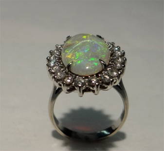 OPAL & DIAMOND RING SET IN 14 K GOLD: OPAL & DIAMOND RING SET IN 14 K GOLD