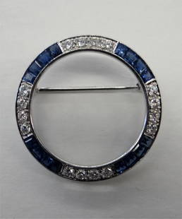 DIAMOND & SAPPHIRE CIRCLE PIN SET IN PLATINUM: DIAMOND & SAPPHIRE CIRCLE PIN SET IN PLATINUM