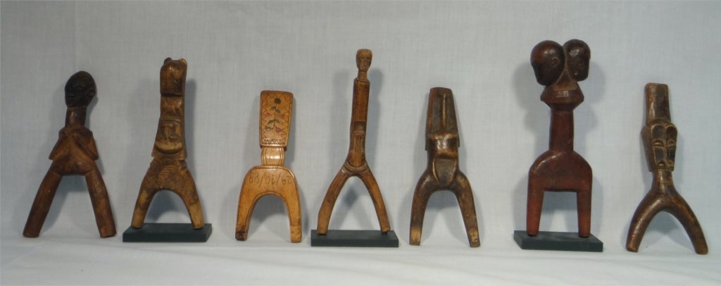 GROUP OF 7 GOLD COAST CARVED SLINGSHOTS: GROUP OF 7 GOLD COAST CARVED SLINGSHOTS