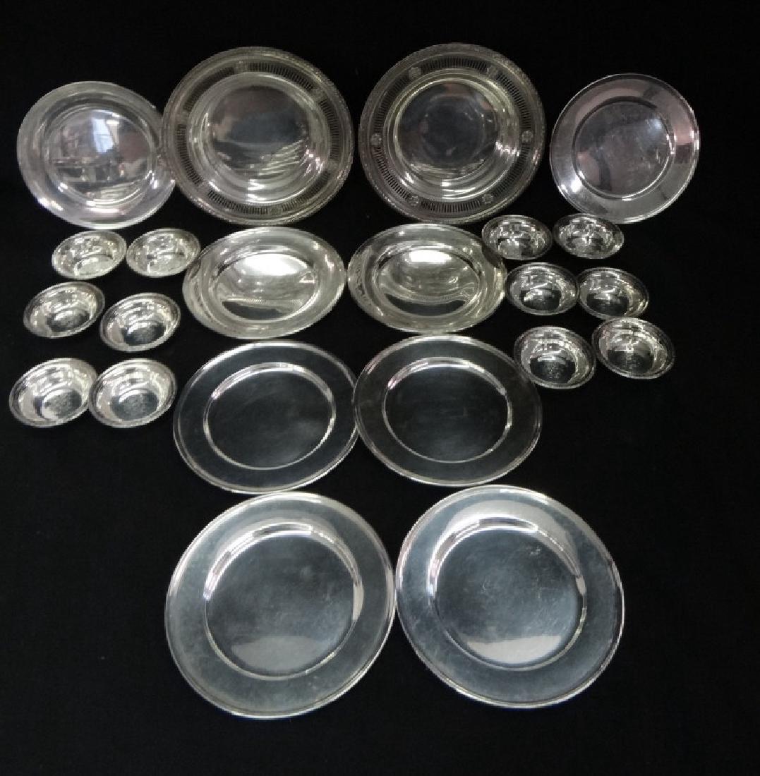 STERLING SILVER INC. 8 BREAD & BUTTER PLATES, 12: NUT DISHES & 2 WINE COASTERS APPROX. 34.15 TROY OZ.