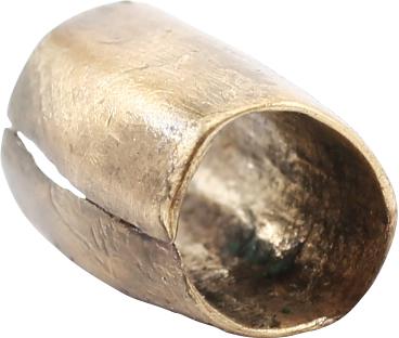 ANCIENT VIKING GILT BEAD, 9TH-11TH CENTURY AD: 9.9mm length, about 3/8". 6.7mm diameter. Hand formed from bronze, forged to hexagonal section with the center swelled to a ridge. Butted seam. Professionally refurbished with the 24karat gold overlay