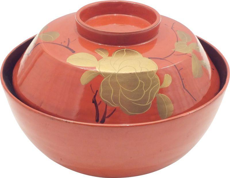 ANTIQUE JAPANESE LACQUERED COVERED BOWL: Meiji Period, 1867-1912. 4 5/8" diameter. Orange body color with a peony bud in gold, flanked by its branches and gold leaf foliage. Executed in shades of gold, produced with pure gold dust. Excellent